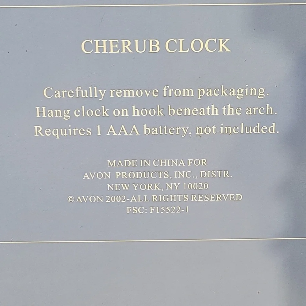 Cherub Clock with Cream Finish